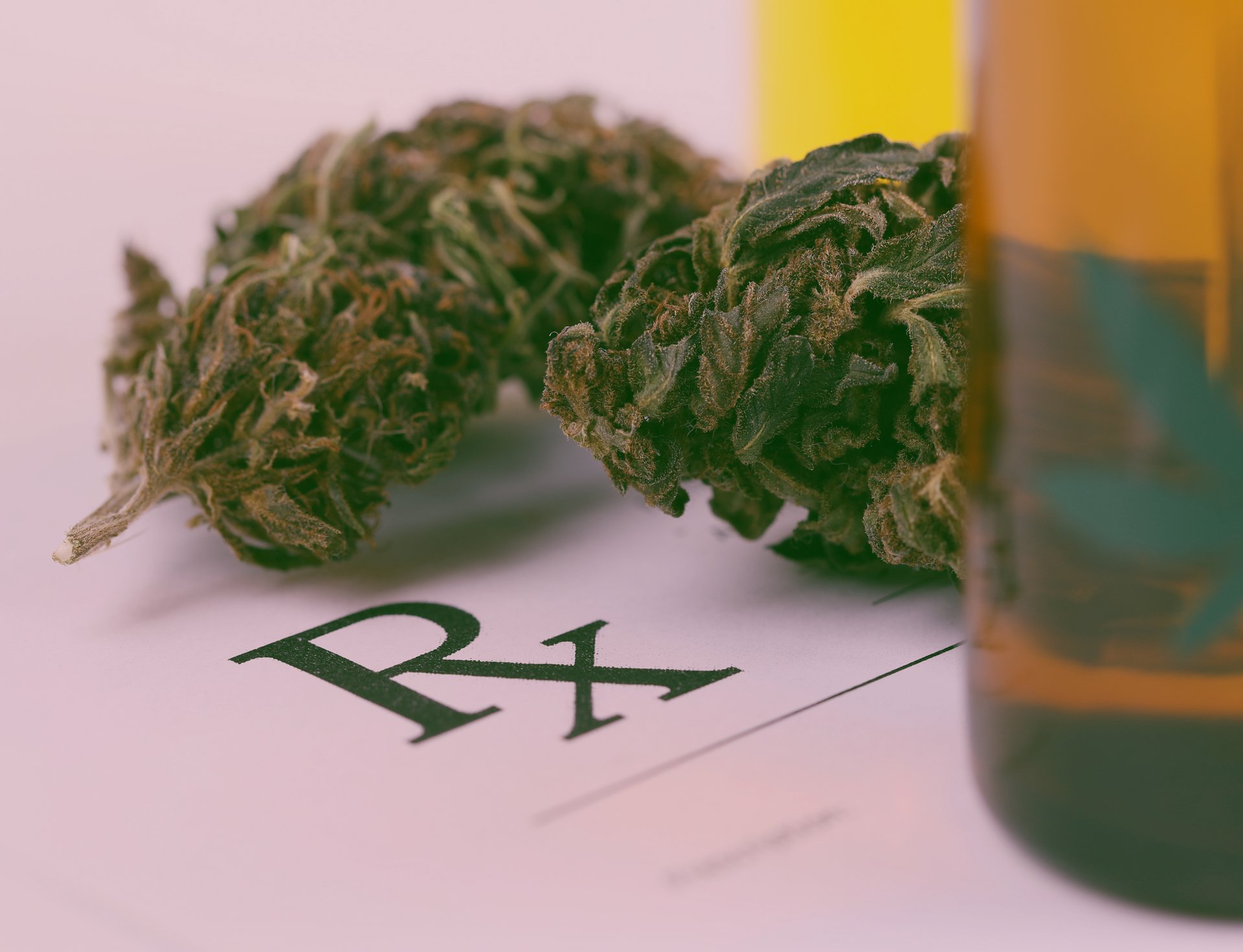 Medicinal cannabis with extract oil in bottle on prescription paper